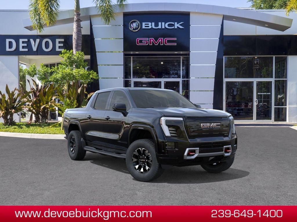 2026 GMC Sierra EV AT4 Max Range in Onyx Black — front three-quarter view