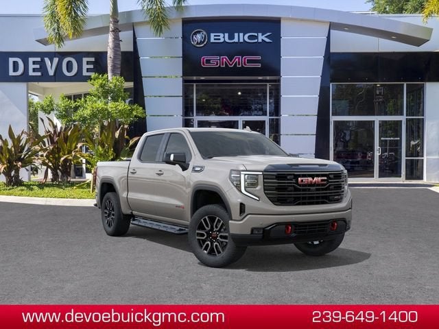 2026 GMC Sierra 1500 AT4 in Coastal Dune — front three-quarter view