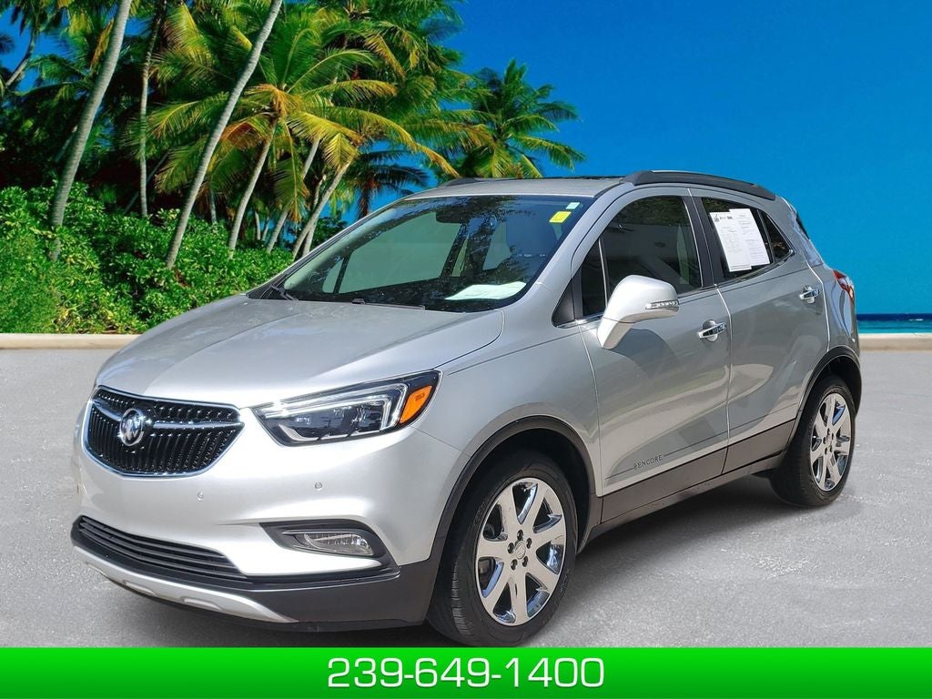 2017 Buick Encore Premium in Includes (Cm5) Black Carbon Metallic Lower Exterior Accent Color, Paint Code W700s.) — front three-quarter view